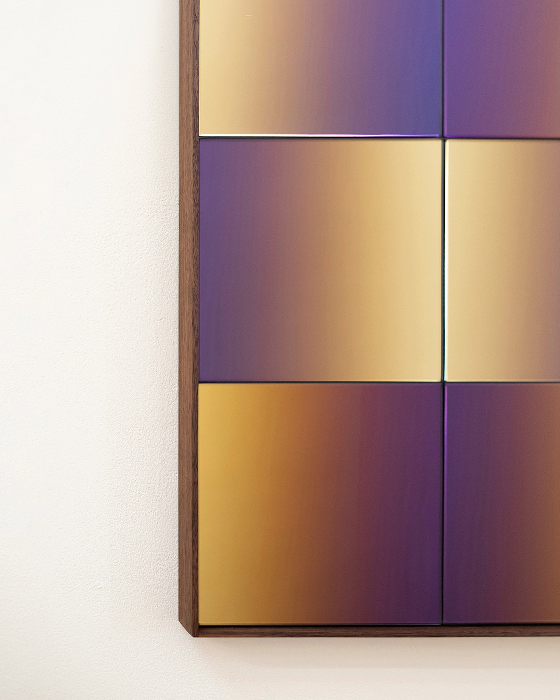 Closeup details of the Bower Studios Lattice Mirror 1 on light color background.