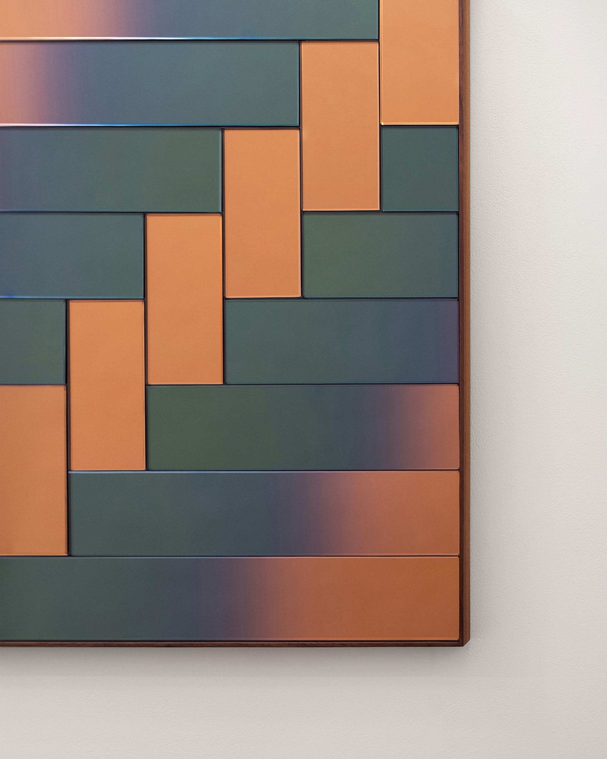 Closeup details of the Bower Studios Lattice Mirror 3 on light color background.