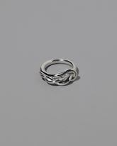 CRZM Sterling Silver Ophiolite Ring on light color background.