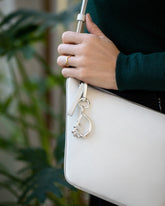 CRZM Sterling Silver Letter D Bag Charm on model.