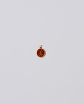 Large Sliced Fruit Charm - Tangerine on light color background.