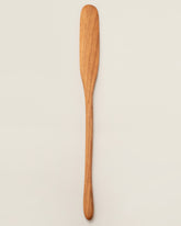 Jonathan's Spoons Mixing Paddle on light color background.