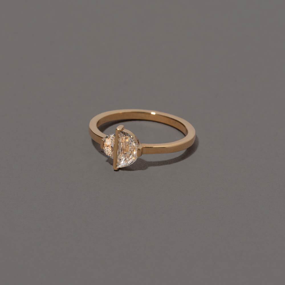 product_details::Closeup details of the Compatibility Ring on grey color background.