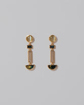 Nigella Earrings on light color background.
