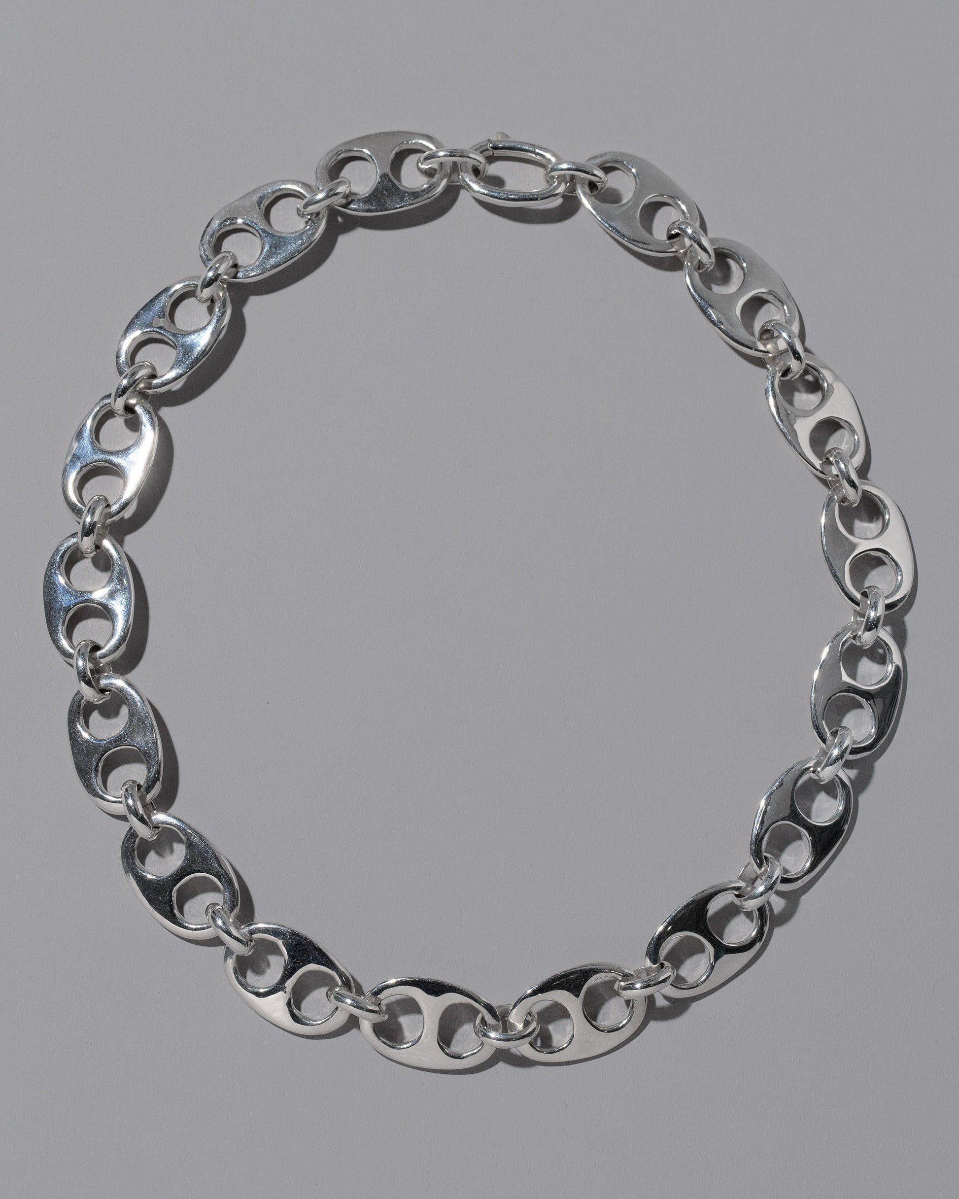 CRZM Sterling Silver Yuba Necklace on light color background.