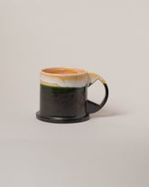 Echo Park Pottery by Peter Shire Yellow and Forest & Black XL Double Dip Mug on light color background.