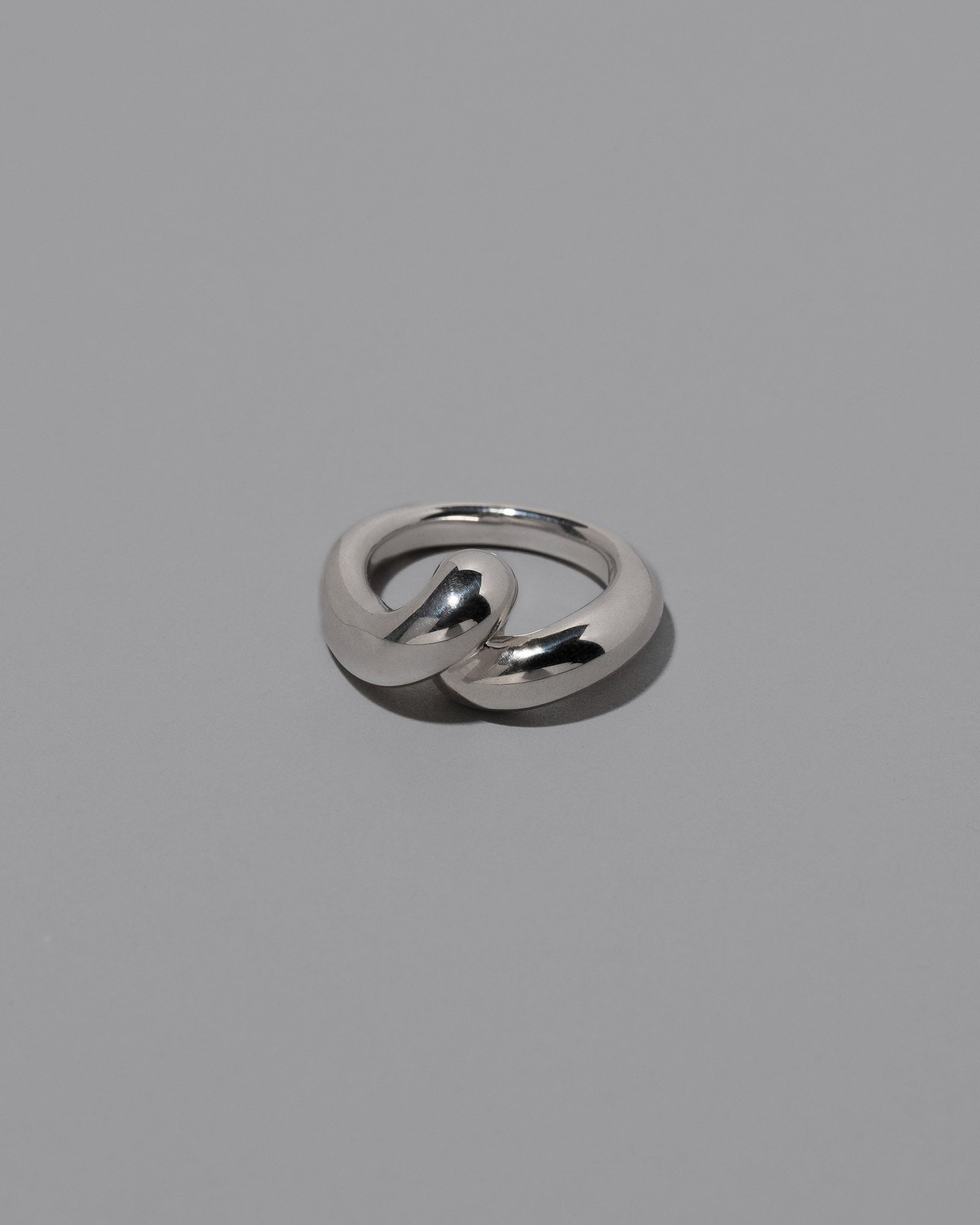 CRZM Sterling Silver Landform Ring on light color background.