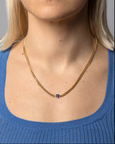 Blue Sapphire Fold Necklace on model.