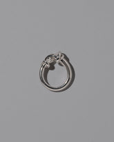 View from the side of the CRZM Sterling Silver Ridge Ring on light color background.