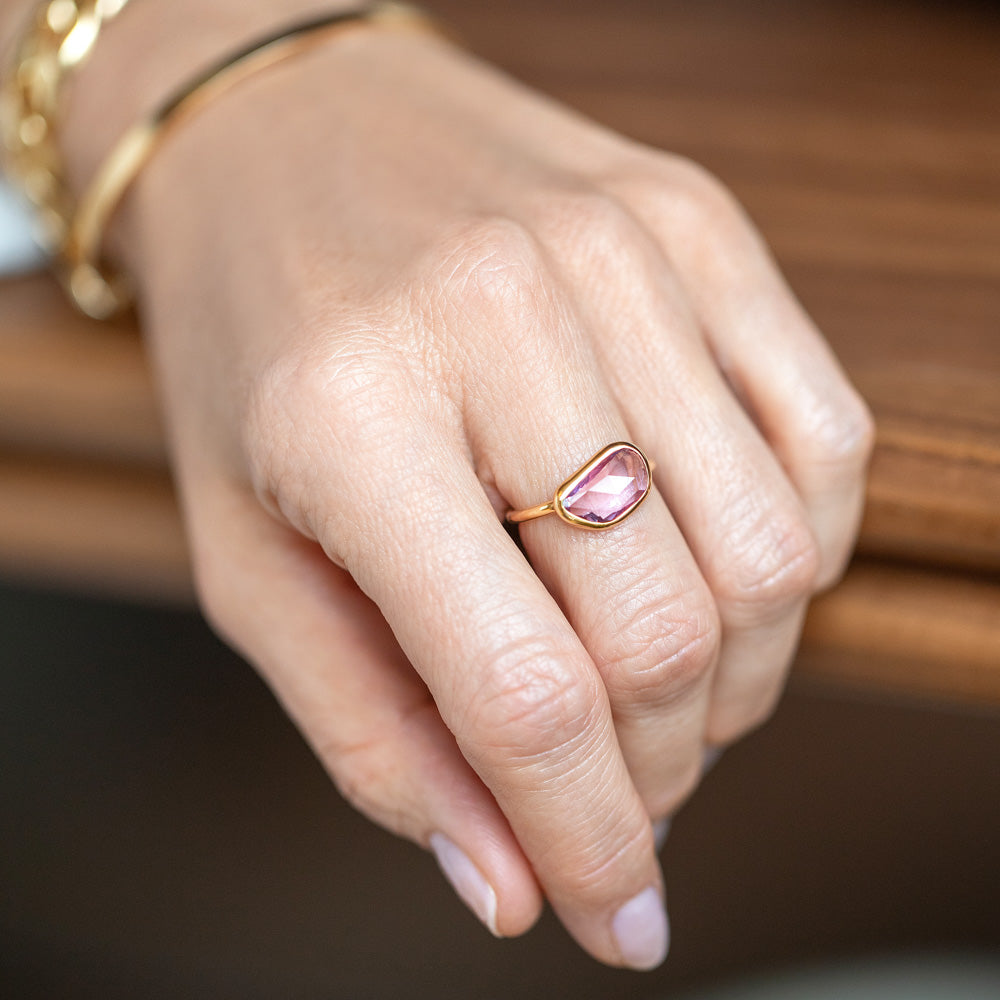 product_details::Gusher Pink Sapphire Ring 011 on model.