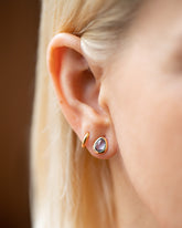 Gusher Blue Sapphire Stud Earrings 002 on model.