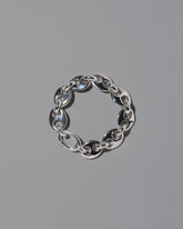 CRZM Sterling Silver Bedrock Bracelet on light color background.