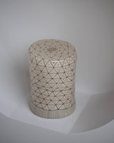 Closeup details of the Suzanne Sullivan No Nonsense Reliability Pedestal on light color background.