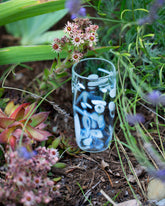 Styled image featuring the Sirius Glassworks White Nassau Tumbler.