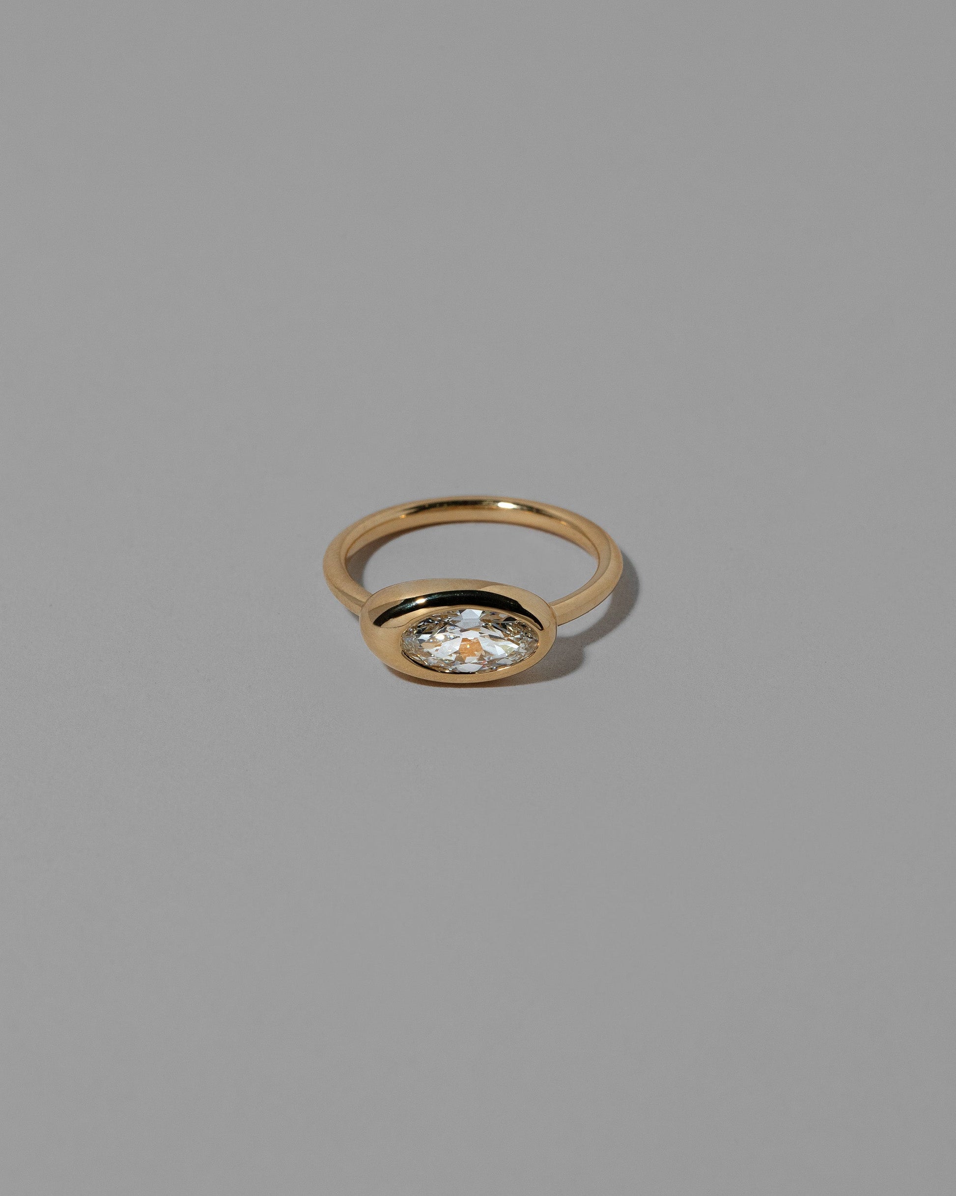 Moval White Diamond Equalize Ring on light color background.