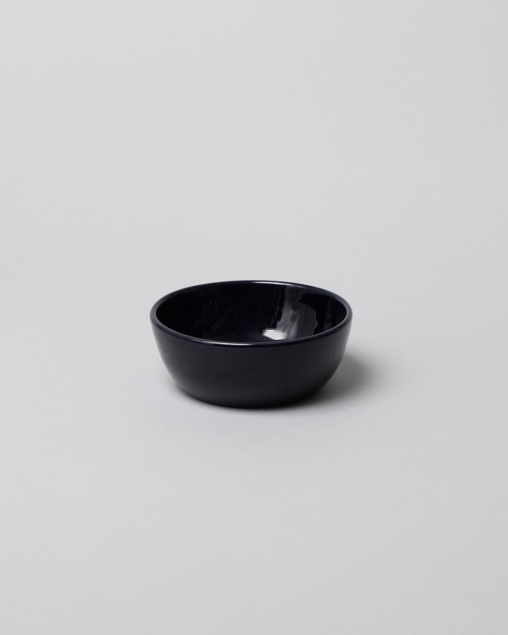La Ceramica Vincenzo Del Monaco Midnight Dessert Bowl on light color background.