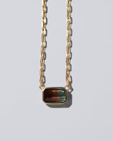 Closeup details of the Field of Love Necklace on light color background.