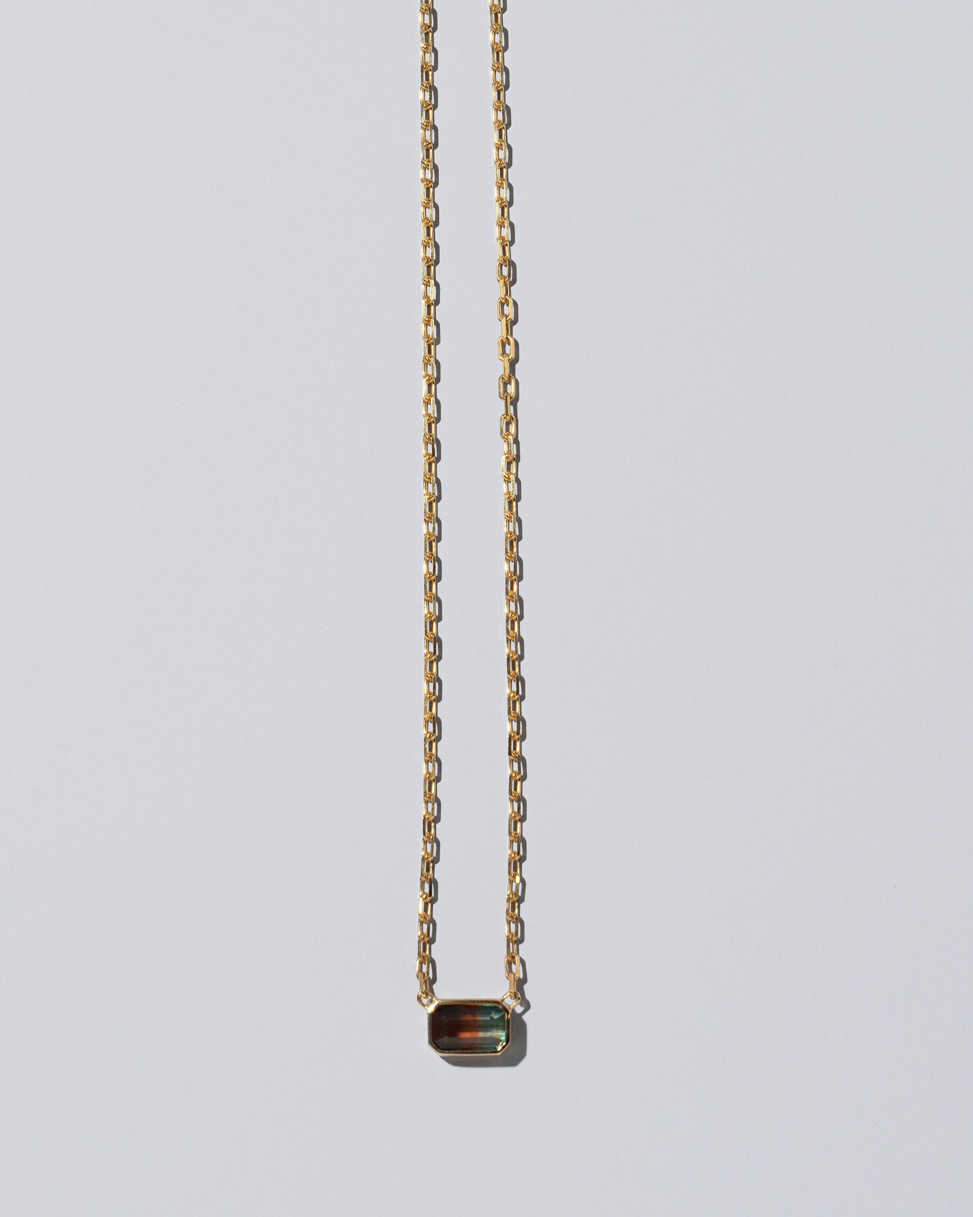 Field of Love Necklace on light color background.