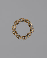 CRZM Gold Yuba Bracelet Medium on light color background.