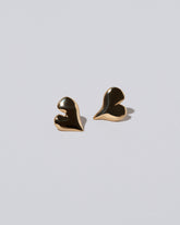Thousand & One Night Heart Stud Earrings on light color background.