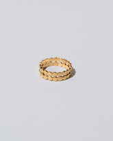 Gold Two Tier Mimosa Band on light color background.