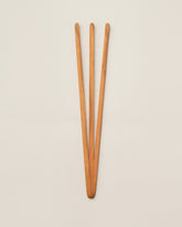 Jonathan's Spoons Pasta Utensil on light color background.