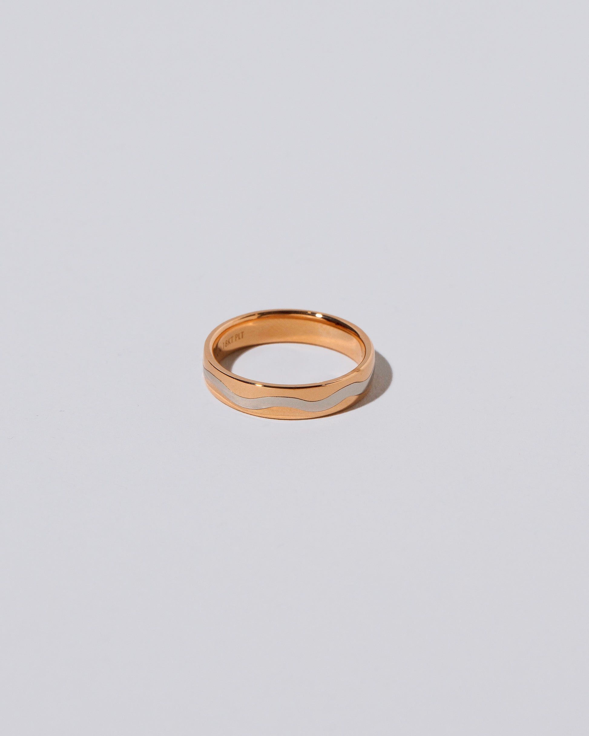 5mm Rose 18K Outside and Platinum Inside Swimming Pool Band on light color background.