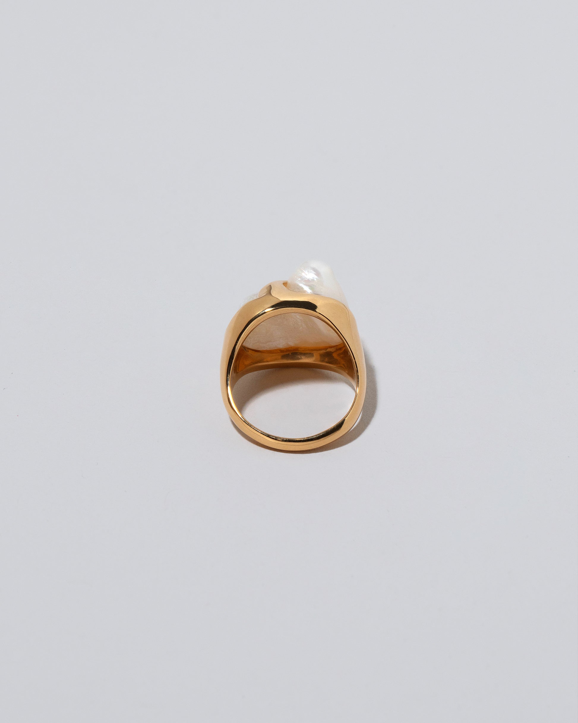 Ibis Pearl Ring on light color background.