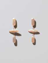 Gull Pearl Earrings on light color background.