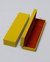 Earrings Green Lacquer Box on light color background.