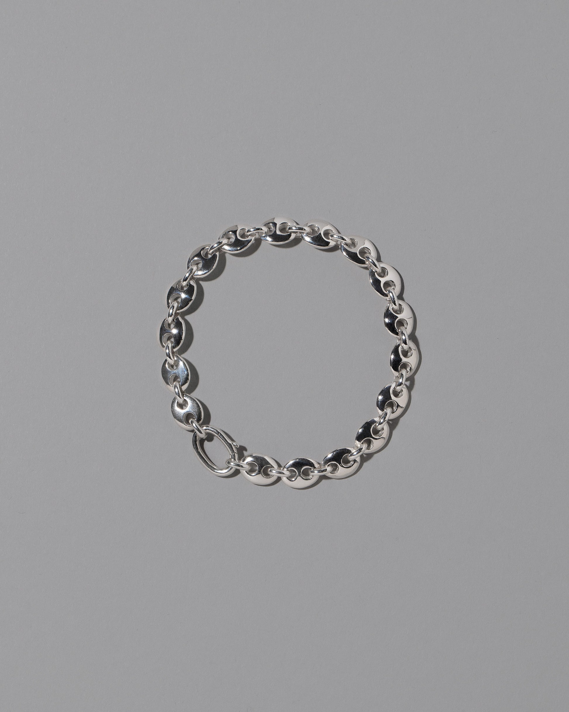 CRZM Sterling Silver Mini Bedrock Bracelet on light color background.