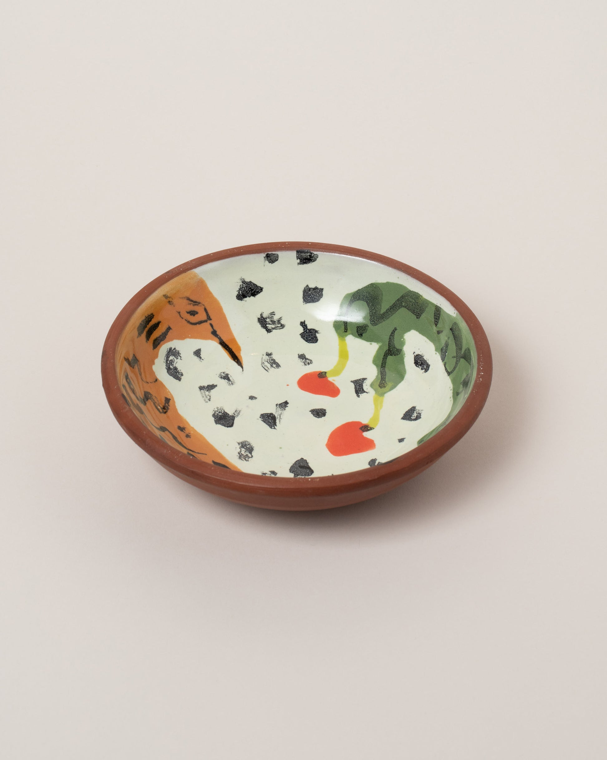 Maggie Boyd One Clay Small Sides Bowl on light color background.
