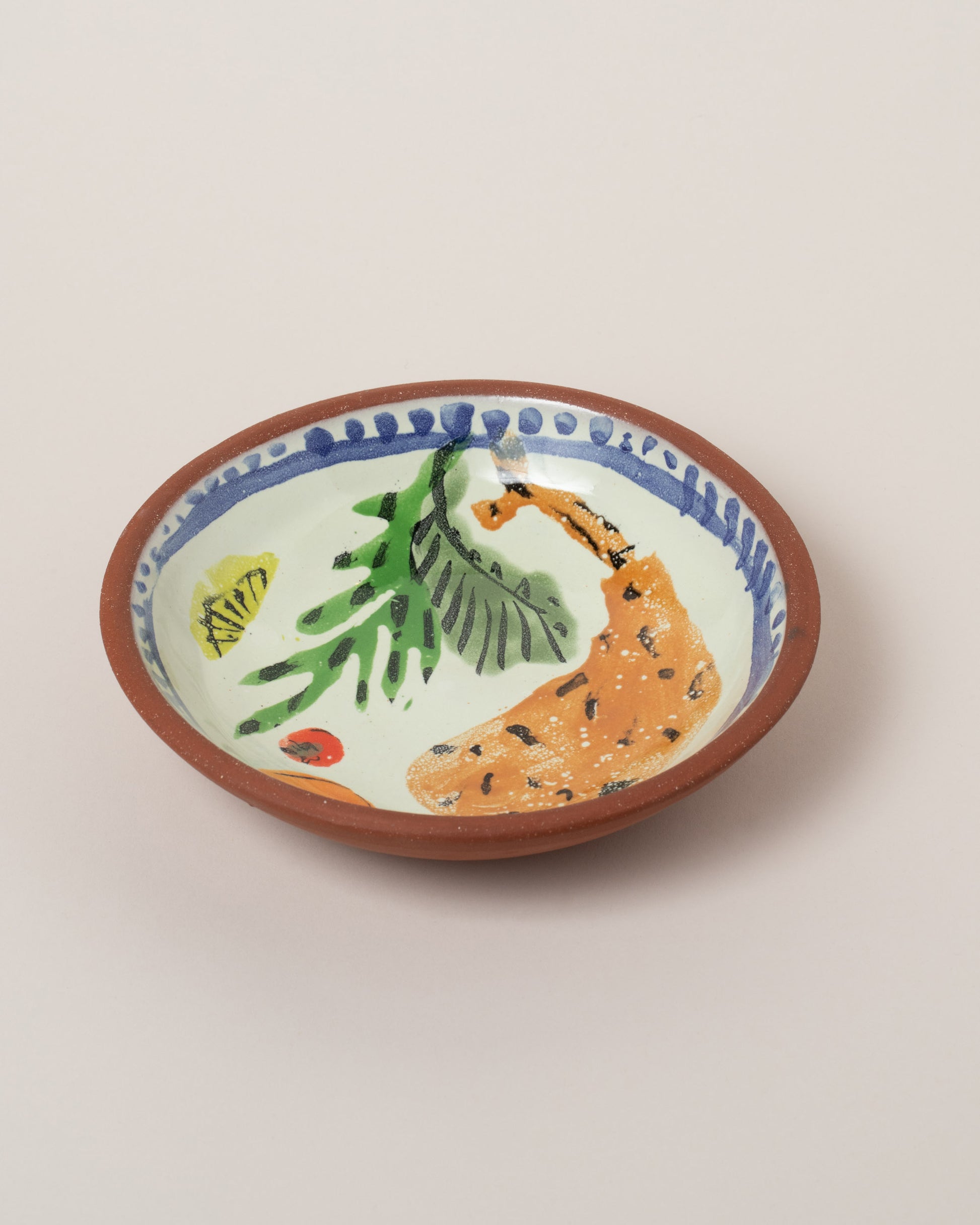 Maggie Boyd Eight Clay Small Sides Bowl on light color background.
