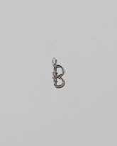 CRZM Medium Letter B Charm set in sterling silver on light color background.