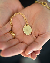 Finished Large Oval Memento Necklace in handle.