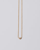 Adamas Necklace on light color background.