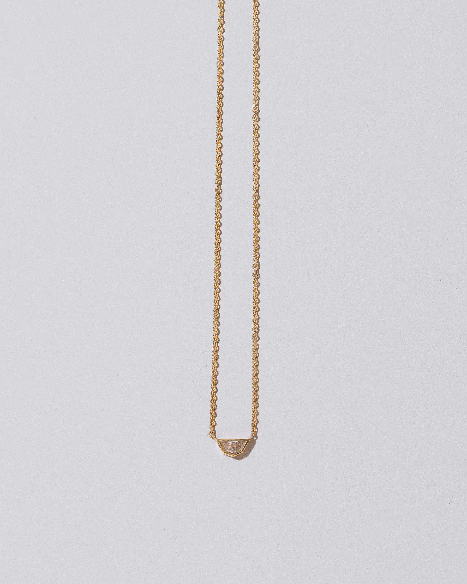 Adamas Necklace on light color background.