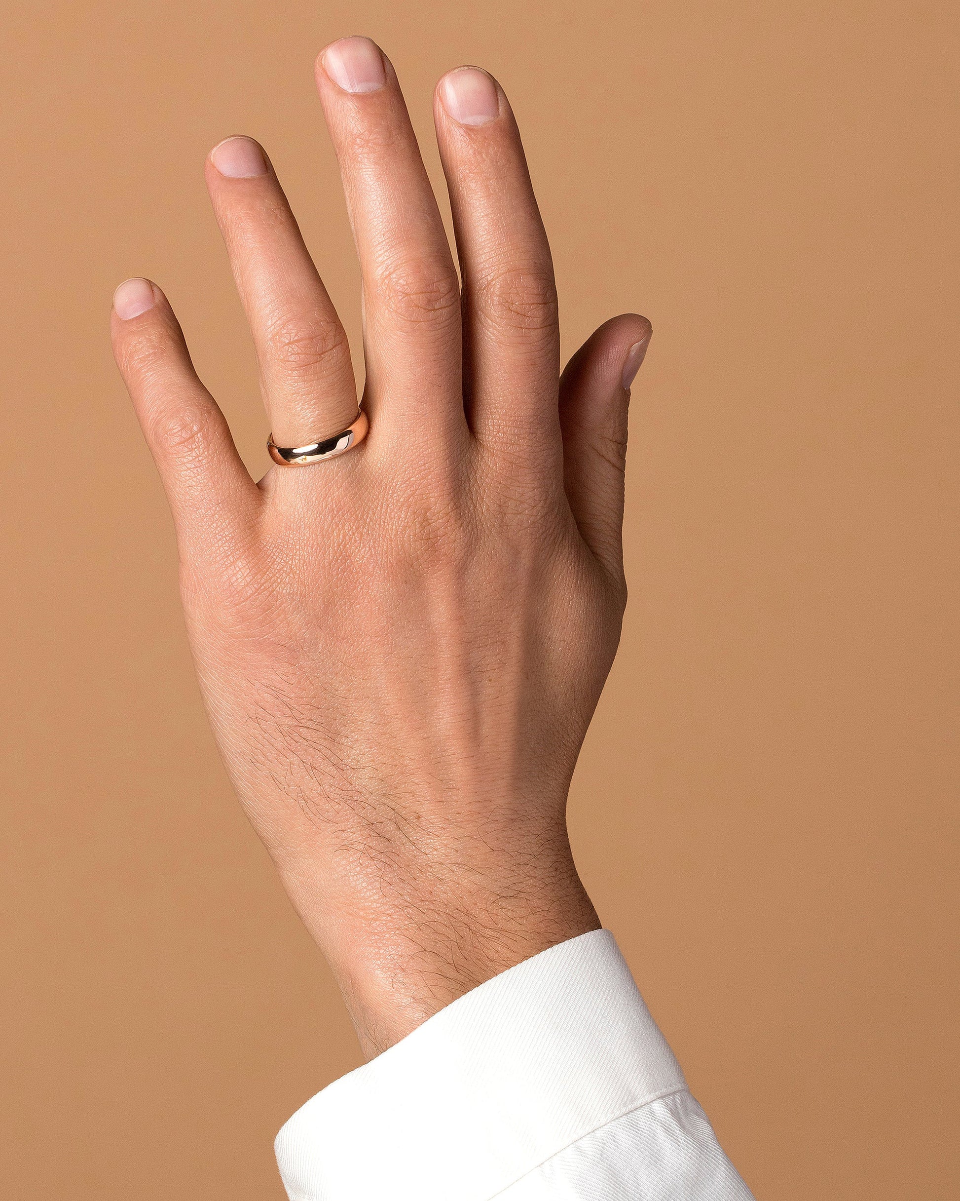 Gold 5mm Half Round Band on male model.