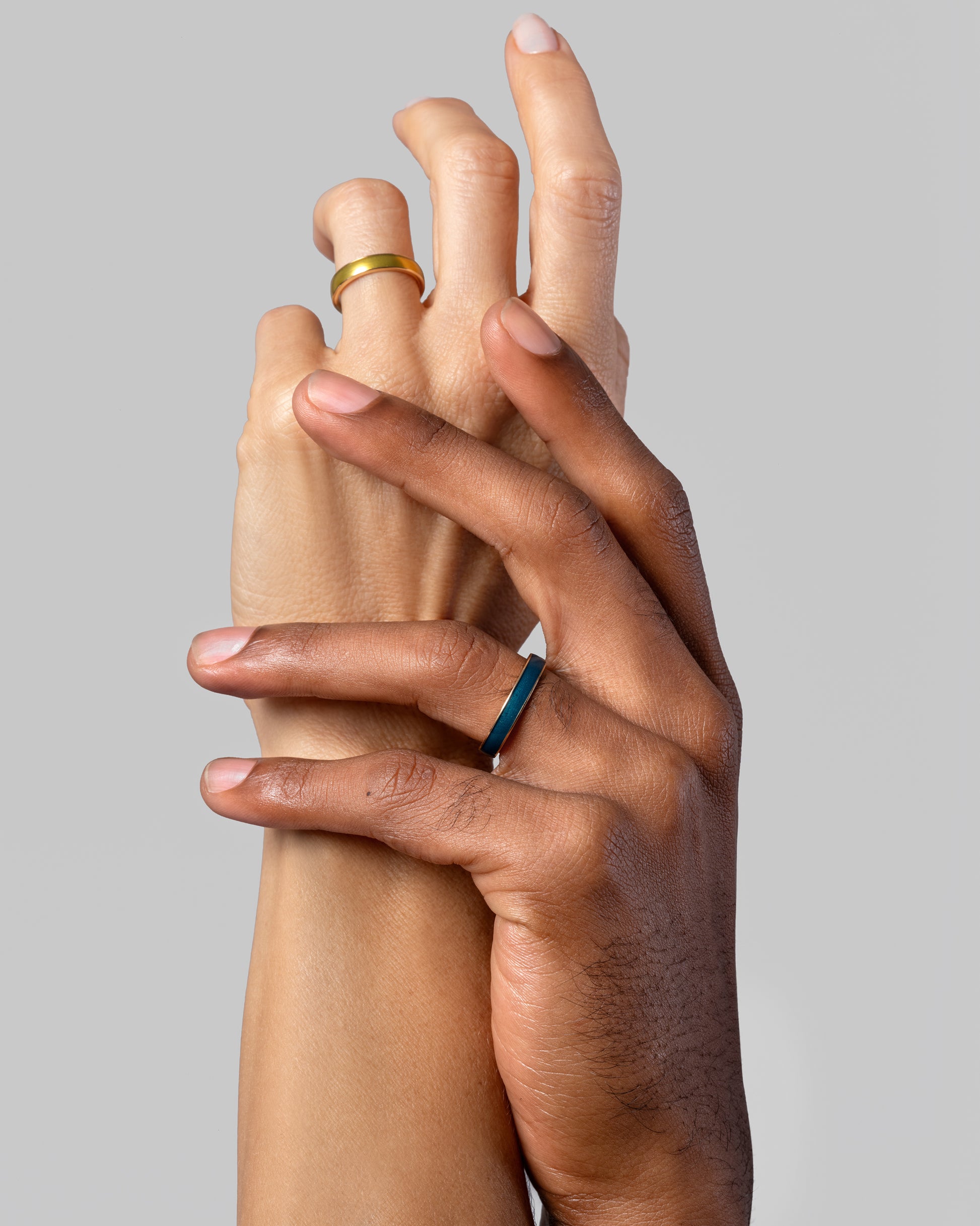 Gold 4mm Enamel Band in Daffodil and Gold 4mm Enamel Band in Veridian on models.