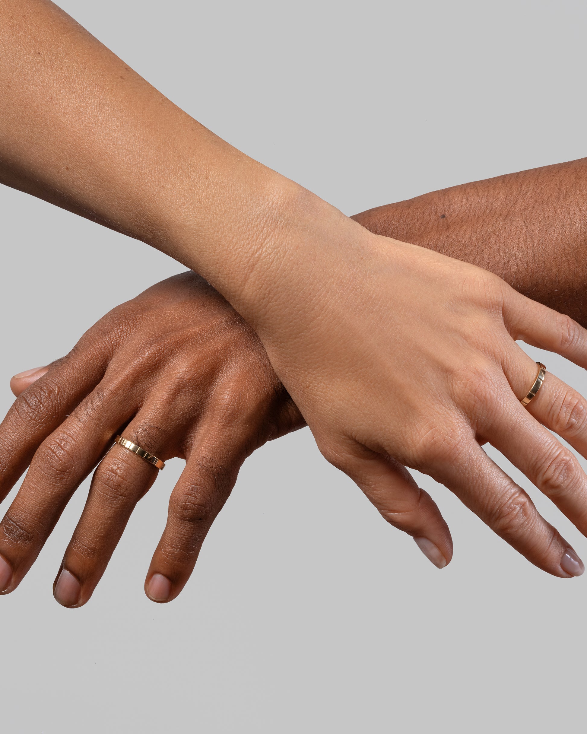 Gold 3mm Etched Lines Bands on models.