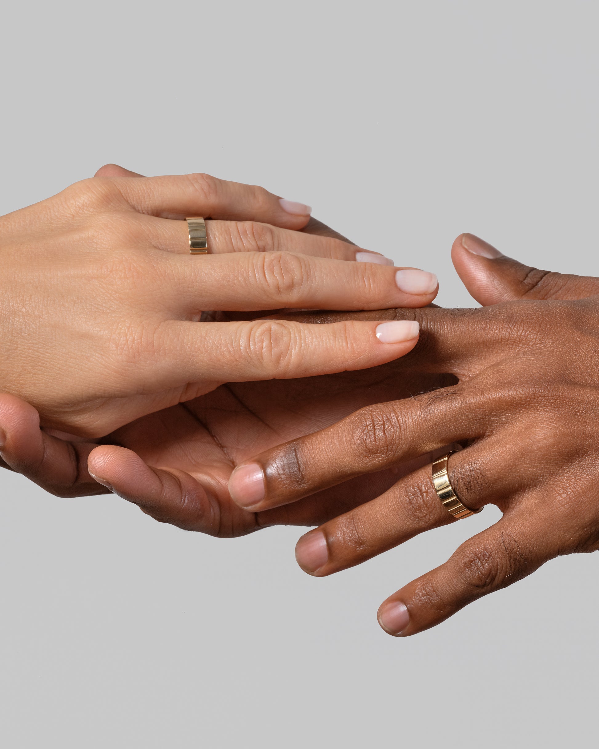 Gold 6mm Etched Lines Bands on models.