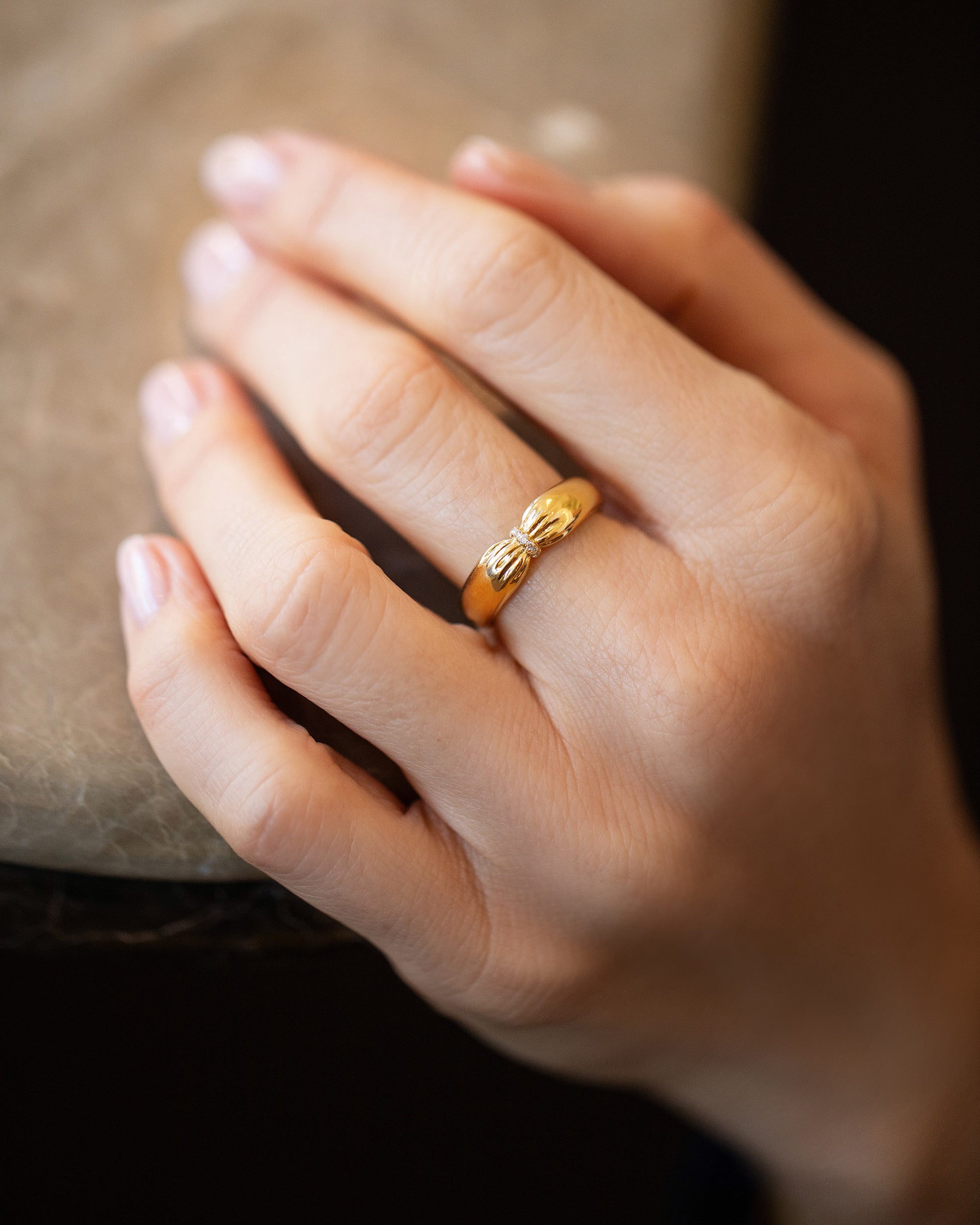 Gold Pavé Pinch Band on model.