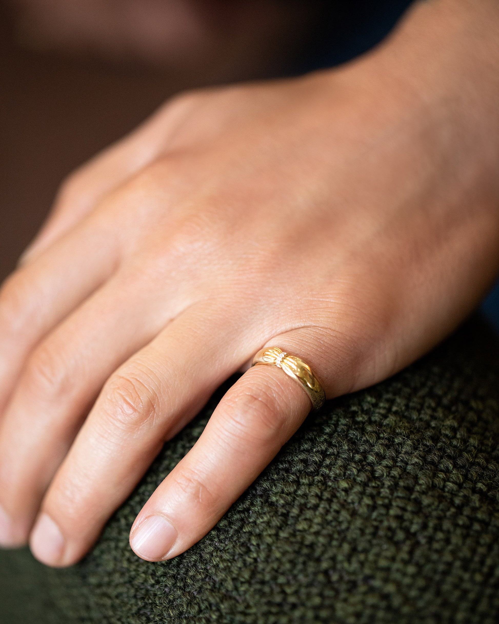 Gold Pavé Pinch Band on male model.