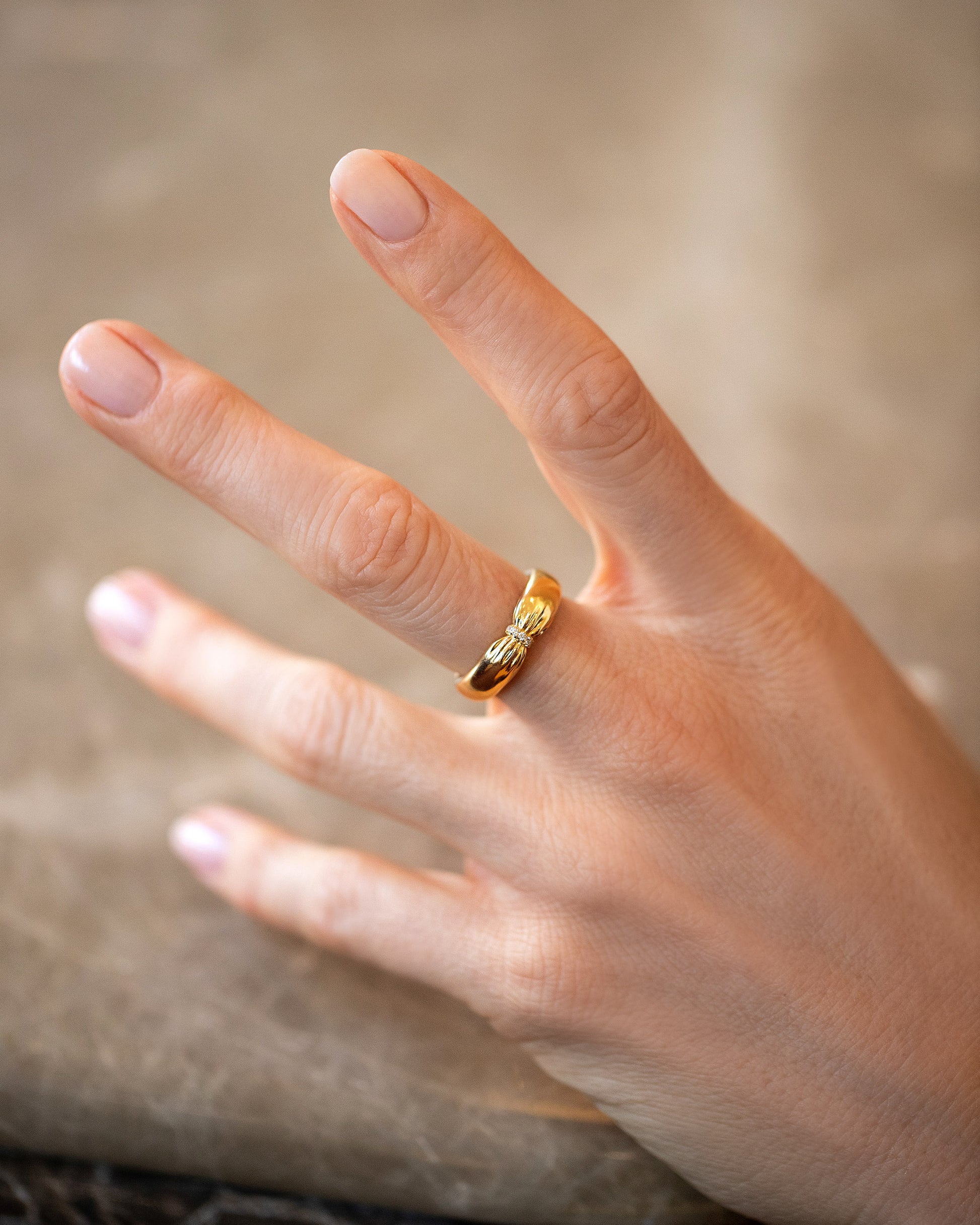 Gold Pavé Pinch Band on model.
