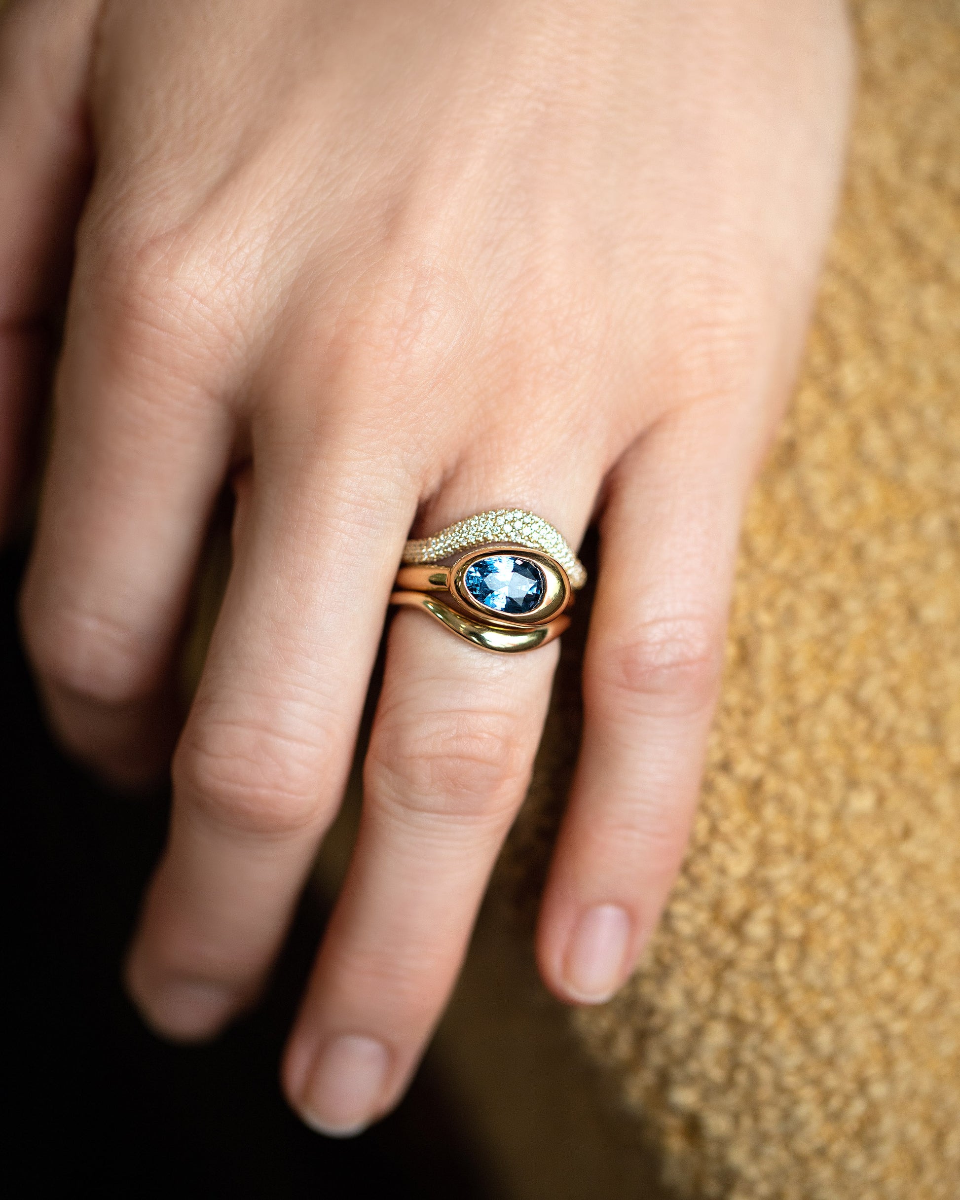 Gold Pavé Thin Level Band, Spinel Grand Align Ring and Gold Thin Level Band on model.