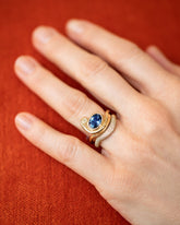 Gold Pavé Thin Level Band and Ambrosina Ring on model.