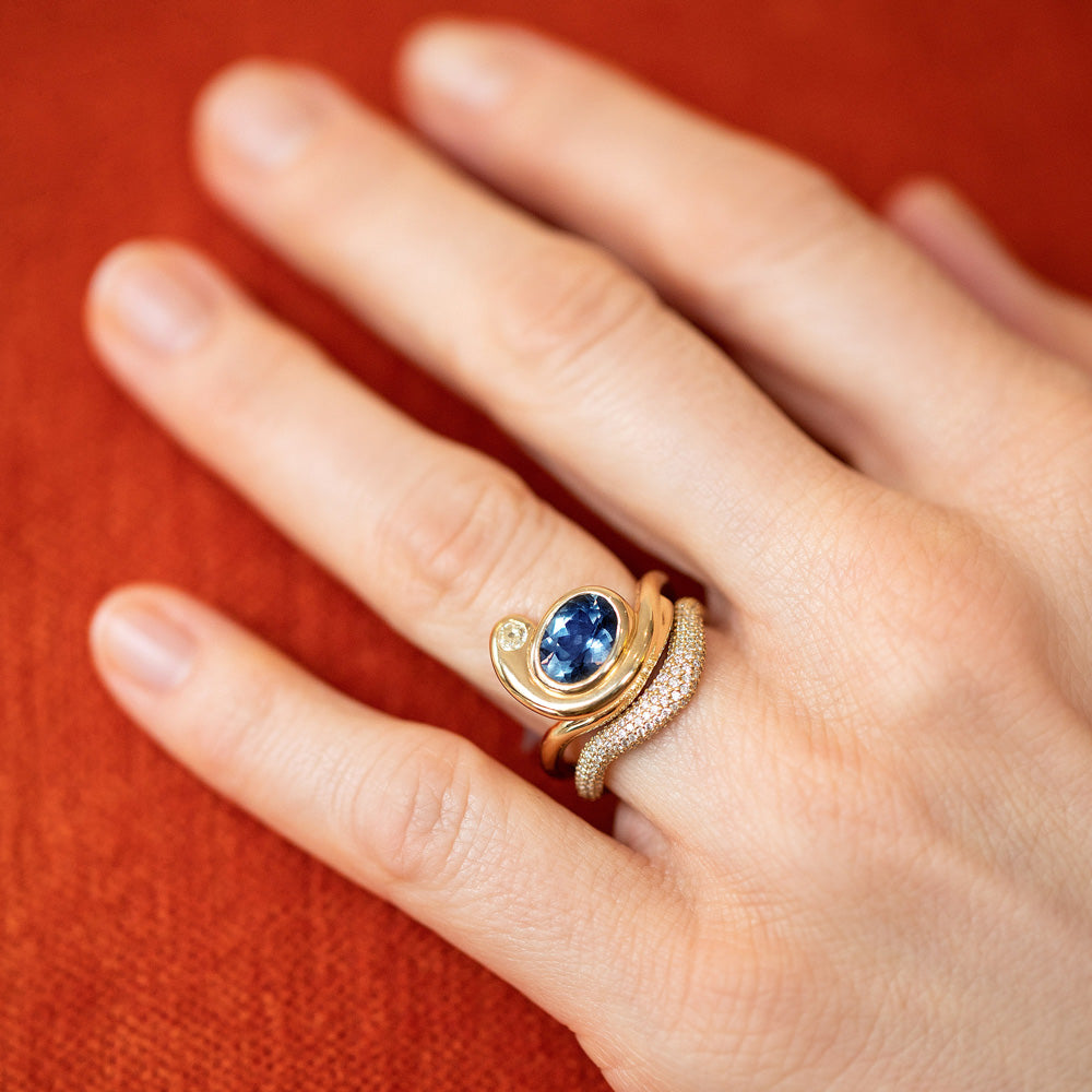 product_details::Gold Pavé Thin Level Band and Ambrosina Ring on model.