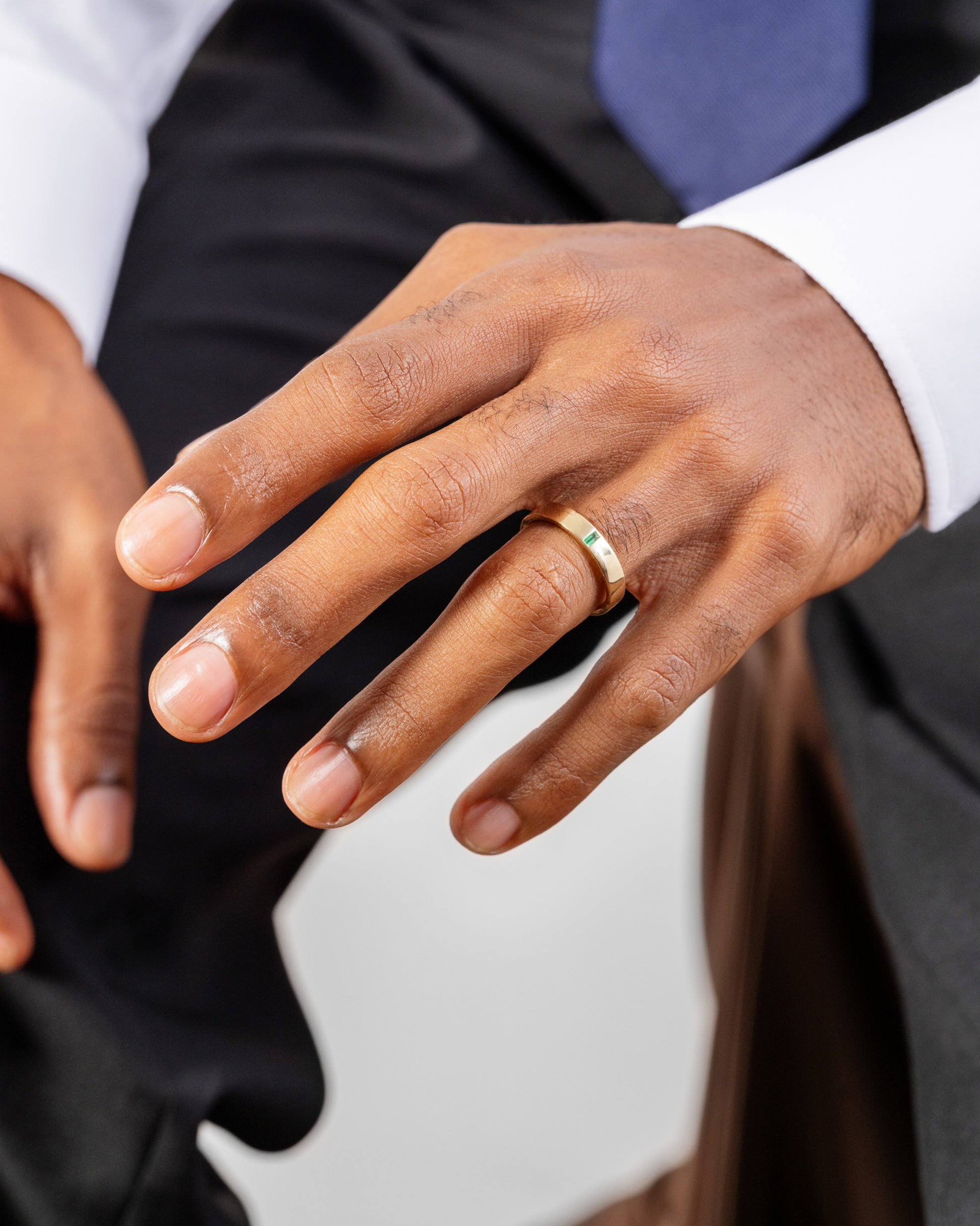 Gold Emerald North South 4mm Baguette-Set Piet Band on male model.