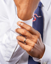 4mm Platinum Outside and 18K Inside Swimming Pool Bands on male model.