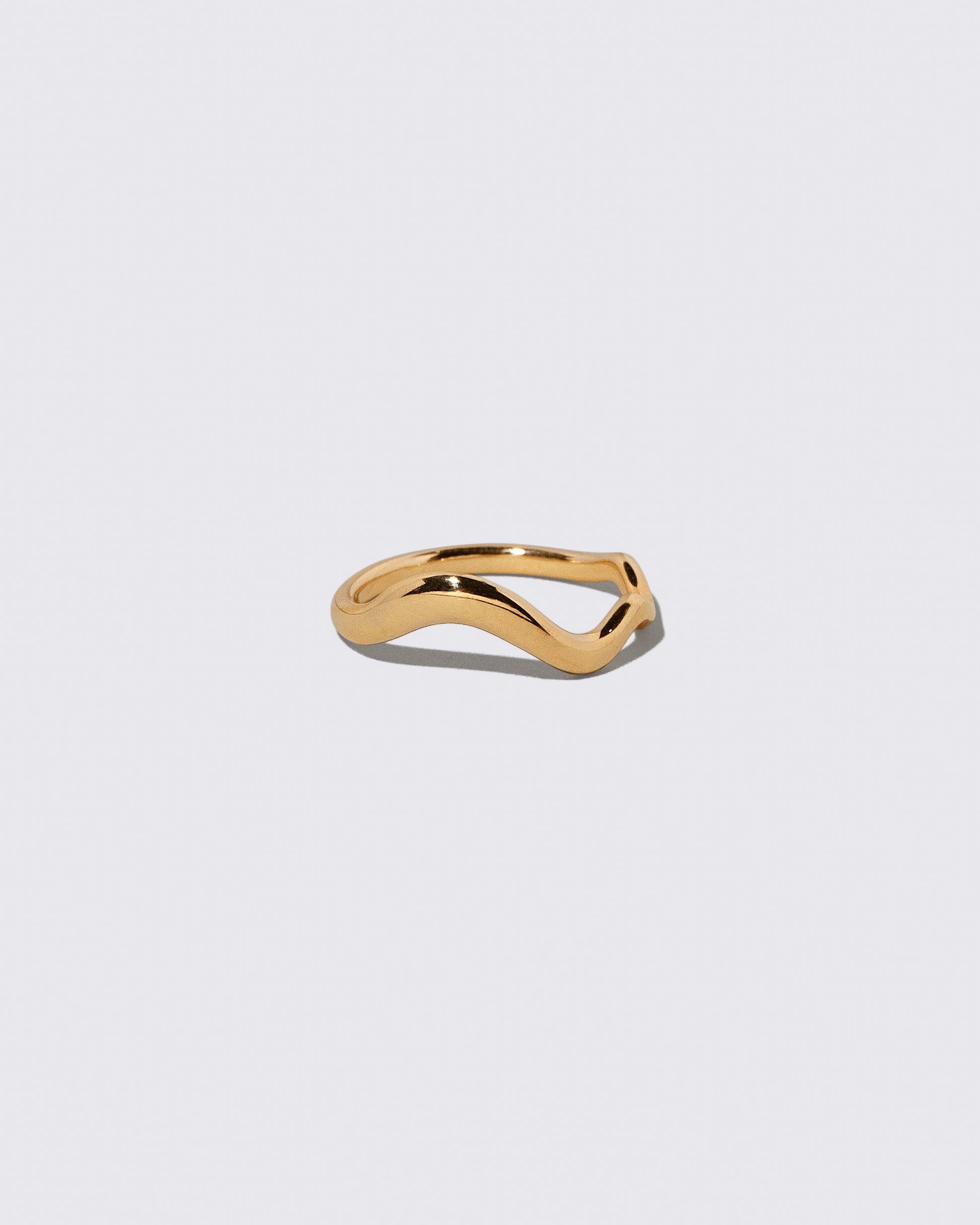 Gold Thin Planate Band on light color background.